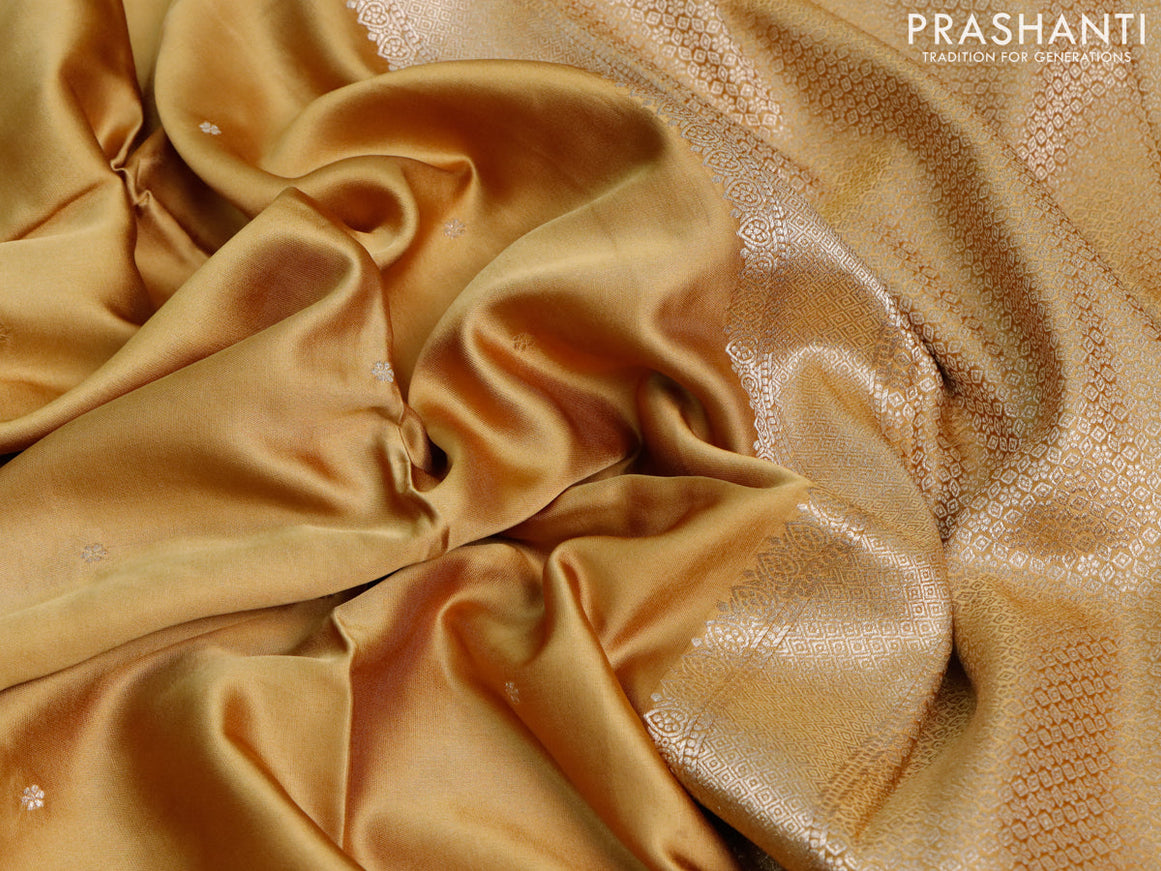 Mushru silk saree mustard shade with zari woven buttas and zari woven butta border