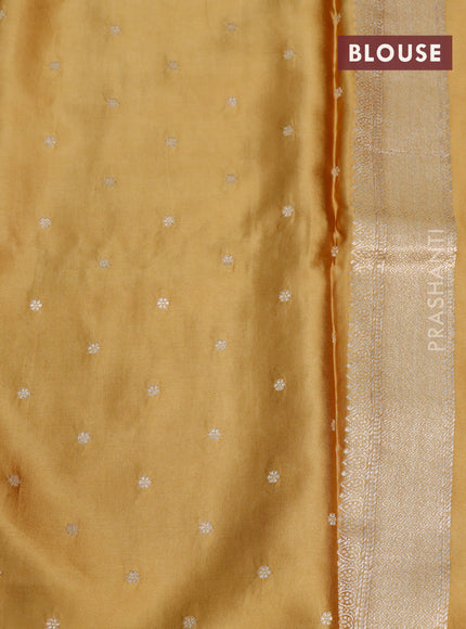 Mushru silk saree mustard shade with zari woven buttas and zari woven butta border