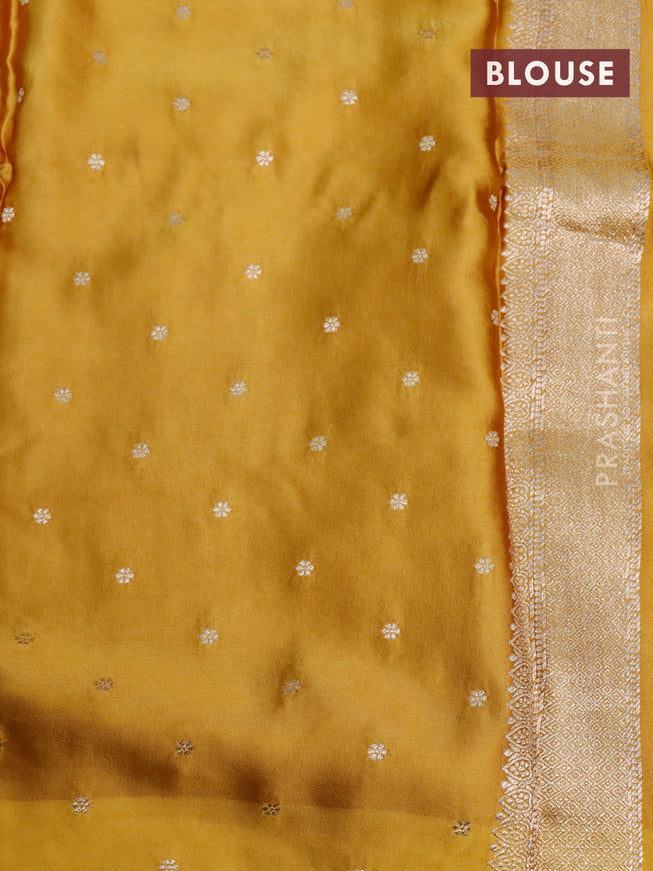 Mushru silk saree dark mustard with zari woven buttas and zari woven butta border