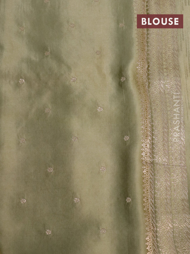 Mushru silk saree pastel green with allover self emboss and zari woven butta border