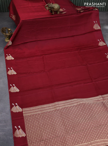 Mushru silk saree maroon with allover self emboss and zari woven butta border