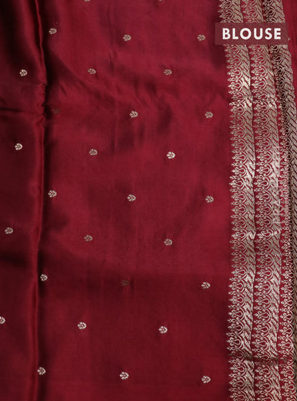 Mushru silk saree maroon with allover self emboss and zari woven butta border