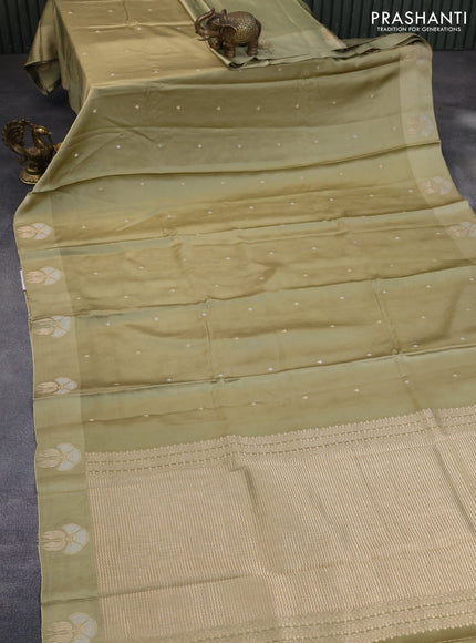 Mushru silk saree pastel green with silver & gold zari woven buttas and zari woven butta border