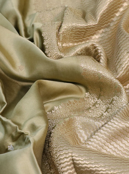 Mushru silk saree pastel green with silver & gold zari woven buttas and zari woven butta border