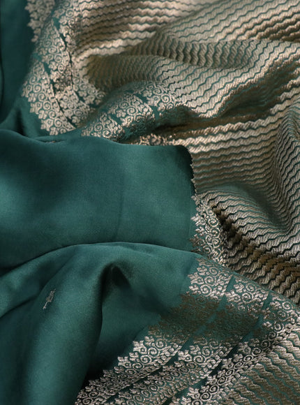 Mushru silk saree dark green with silver & gold zari woven buttas and zari woven butta border