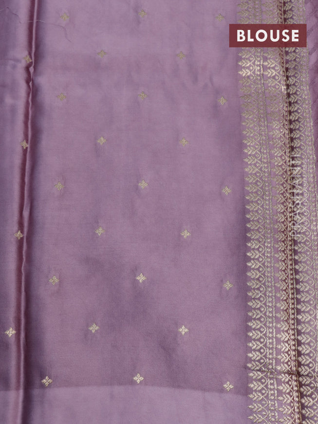 Mushru silk saree pastel purple with allover self emboss and zari woven butta border