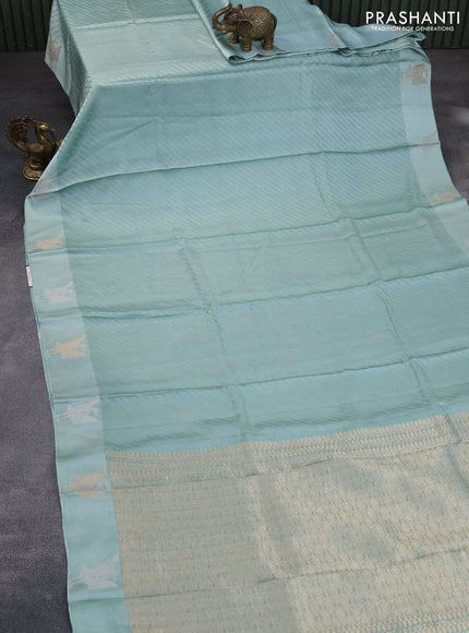 Mushru silk saree pastel blue with allover self emboss and zari woven butta border