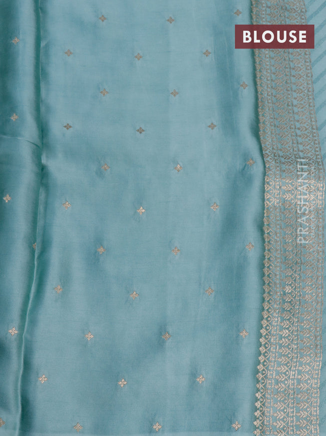 Mushru silk saree pastel blue with allover self emboss and zari woven butta border