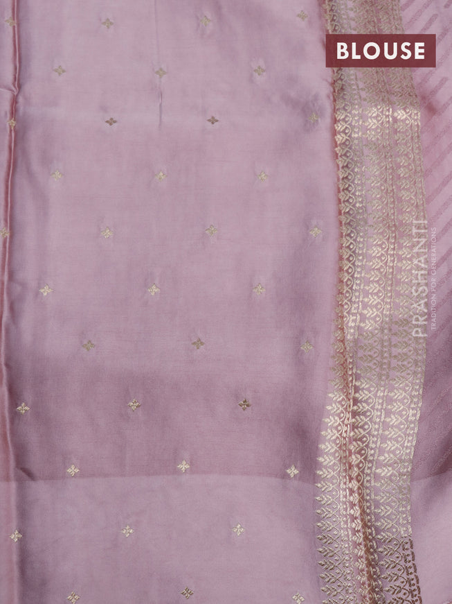 Mushru silk saree pastel pink with allover self emboss and zari woven butta border