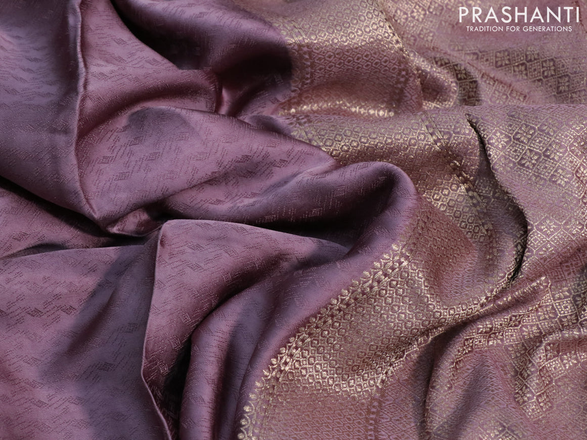 Mushru silk saree pastel purple with allover self emboss and zari woven butta border