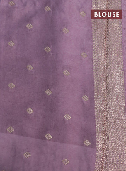 Mushru silk saree pastel purple with allover self emboss and zari woven butta border