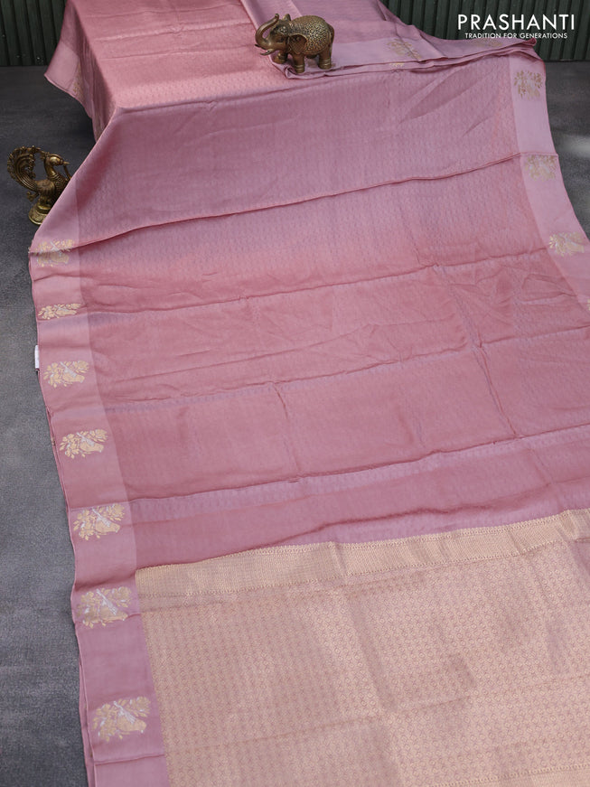 Mushru silk saree pastel pink with allover self emboss and zari woven butta border