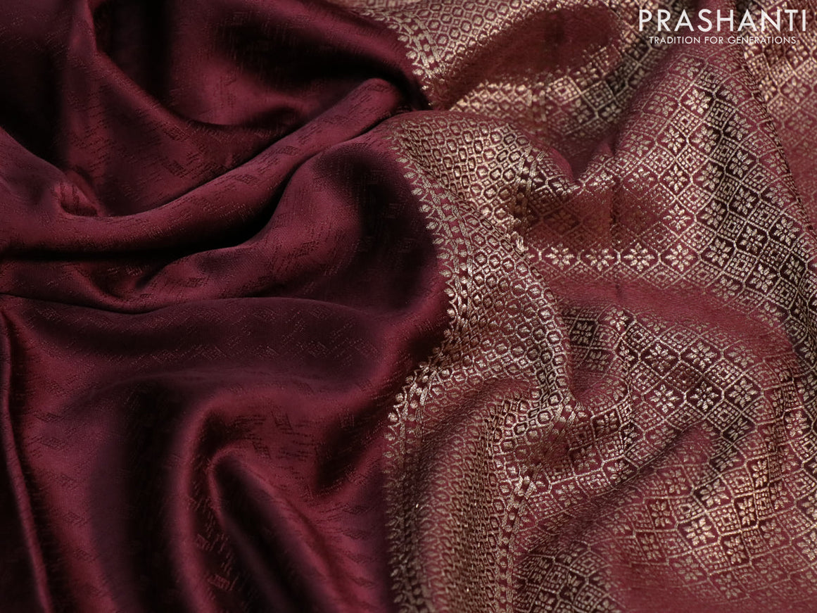 Mushru silk saree deep maroon with allover self emboss and zari woven butta border