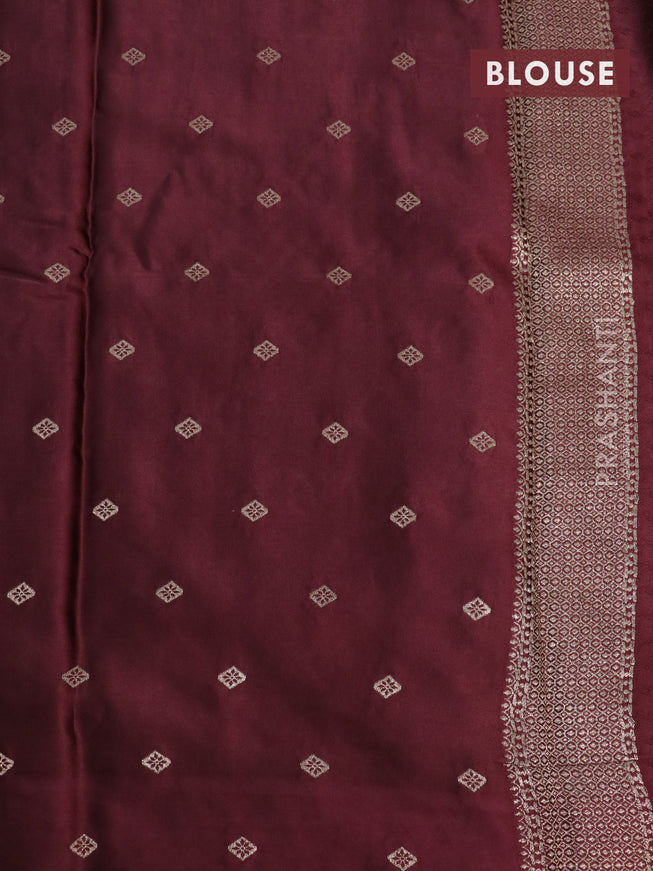 Mushru silk saree deep maroon with allover self emboss and zari woven butta border