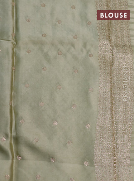 Mushru silk saree pastel green with allover self emboss & zari buttas and zari woven butta border