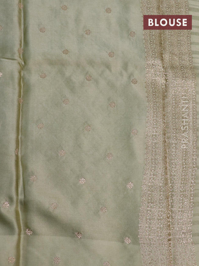 Mushru silk saree pastel green with allover self emboss & zari buttas and zari woven butta border