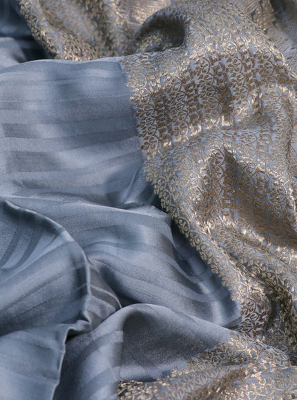 Mushru silk saree grey with allover self emboss & zari buttas and zari woven butta border