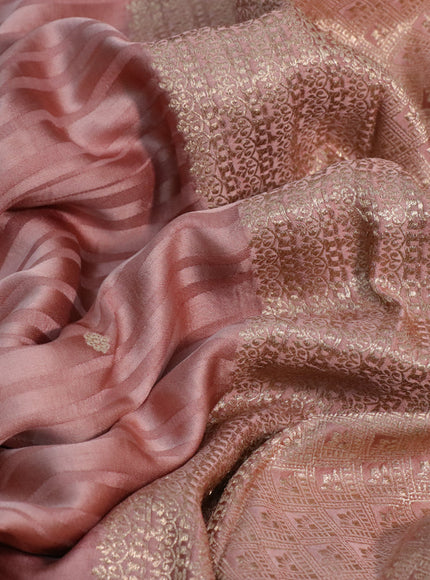 Mushru silk saree pastel peach with allover self emboss & zari buttas and zari woven butta border