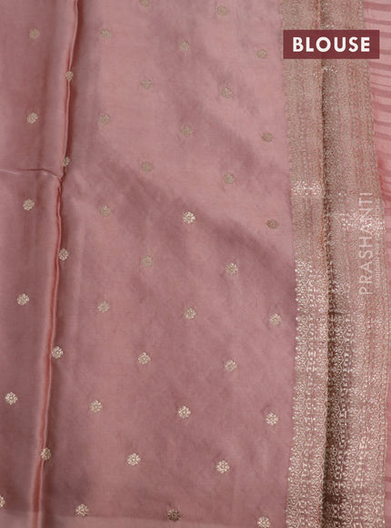 Mushru silk saree pastel peach with allover self emboss & zari buttas and zari woven butta border