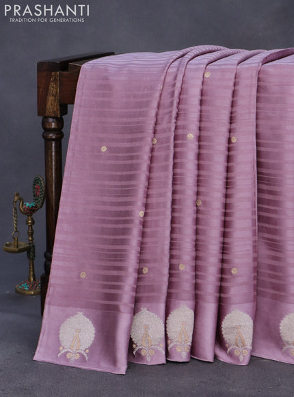 Mushru silk saree pastel purple with allover self emboss & zari buttas and zari woven butta border