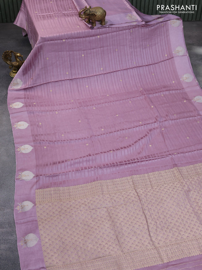 Mushru silk saree pastel purple with allover self emboss & zari buttas and zari woven butta border