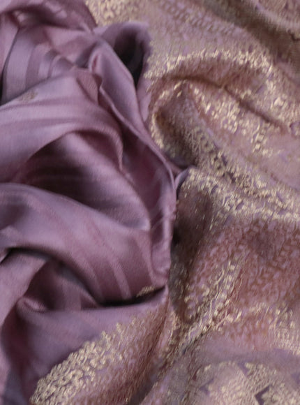 Mushru silk saree pastel purple with allover self emboss & zari buttas and zari woven butta border