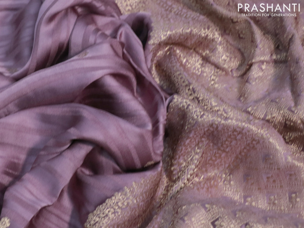 Mushru silk saree pastel purple with allover self emboss & zari buttas and zari woven butta border