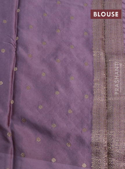 Mushru silk saree pastel purple with allover self emboss & zari buttas and zari woven butta border