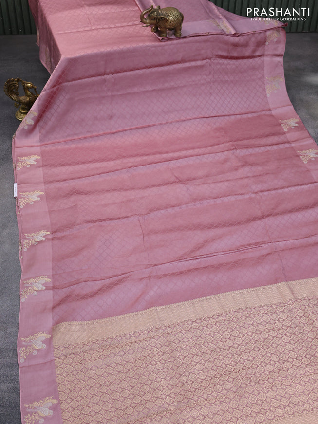 Mushru silk saree pastel pink with allover self emboss and zari woven butta border