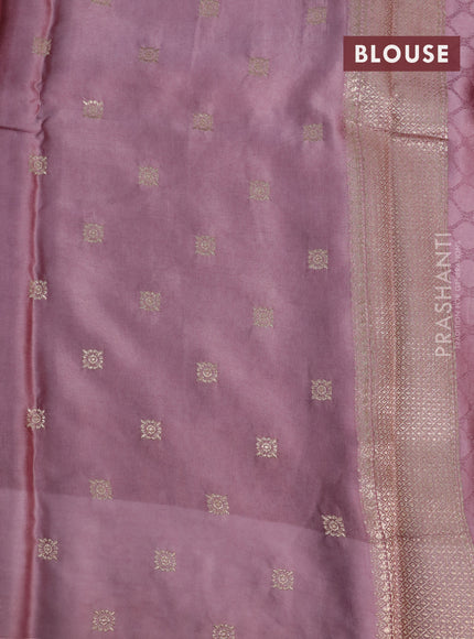 Mushru silk saree pastel pink with allover self emboss and zari woven butta border