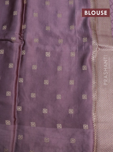 Mushru silk saree pastel purple with allover self emboss and zari woven butta border