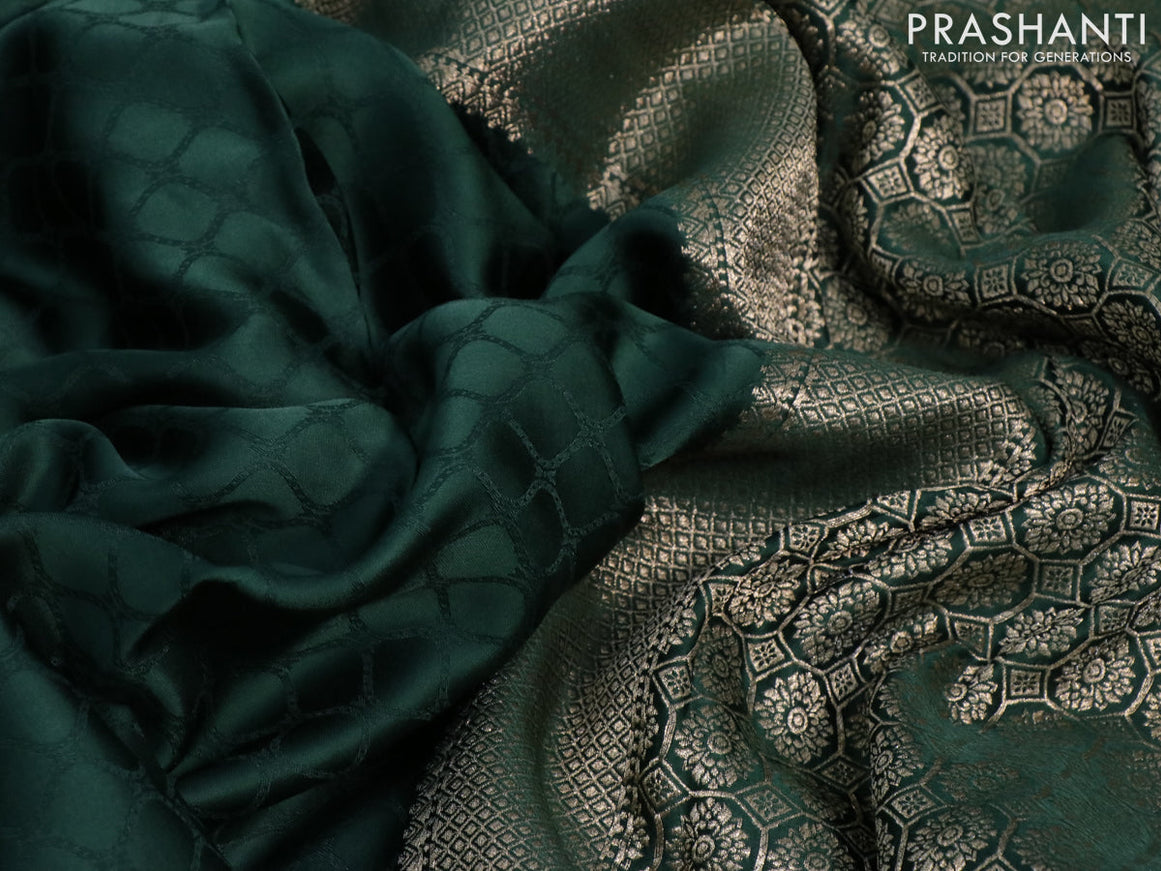 Mushru silk saree green with allover self emboss and zari woven butta border