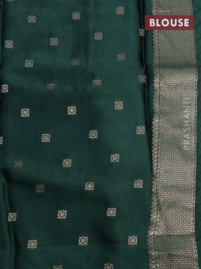 Mushru silk saree green with allover self emboss and zari woven butta border