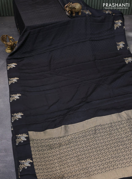 Mushru silk saree black with allover self emboss and zari woven butta border