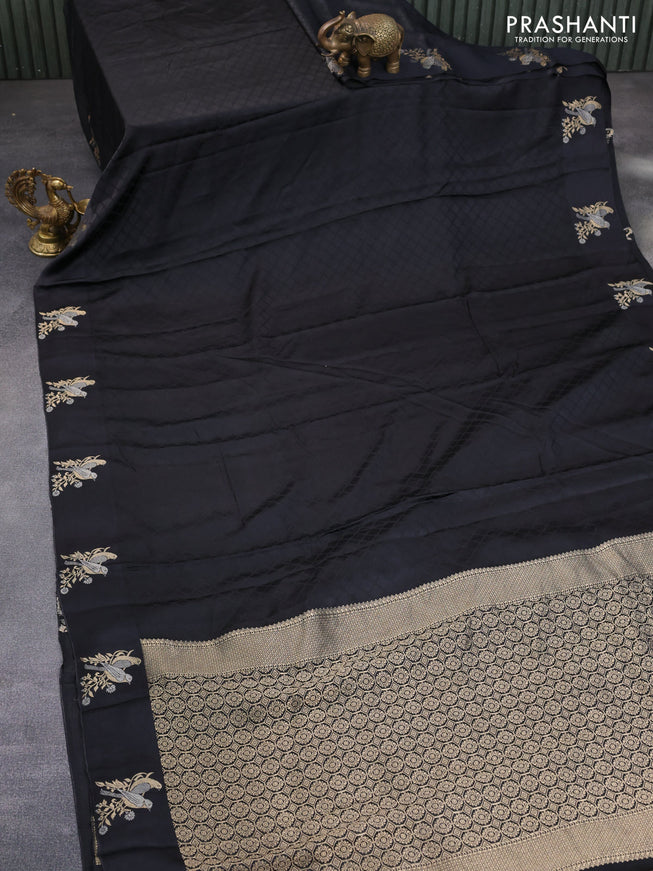 Mushru silk saree black with allover self emboss and zari woven butta border