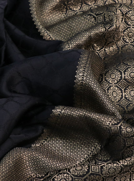 Mushru silk saree black with allover self emboss and zari woven butta border