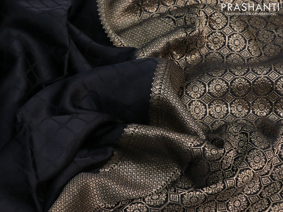 Mushru silk saree black with allover self emboss and zari woven butta border