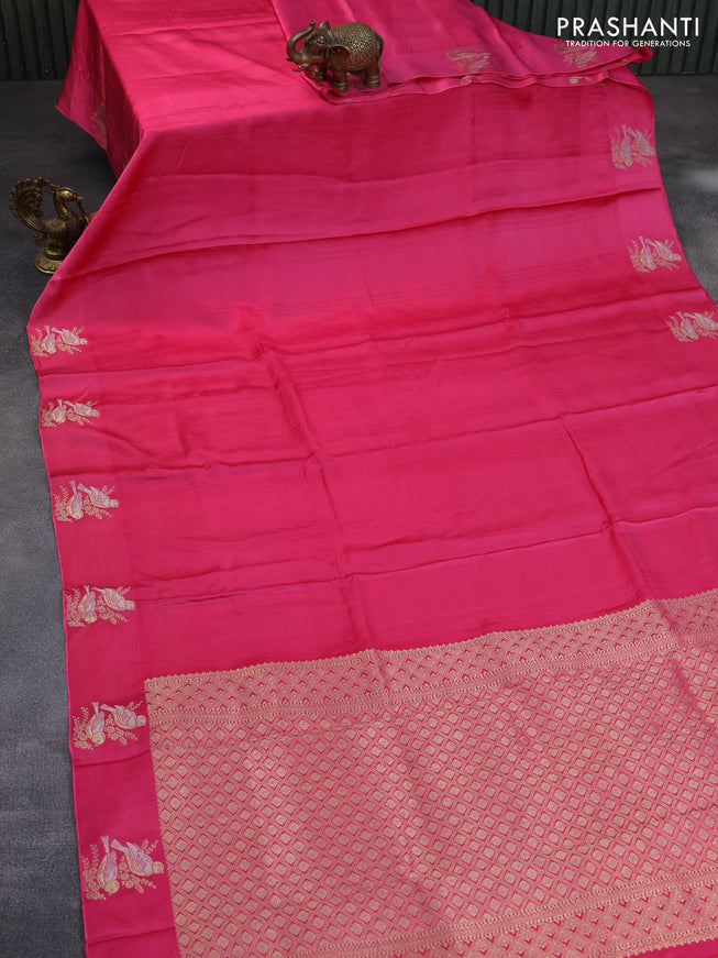 Mushru silk saree pink with allover self emboss and zari woven butta border