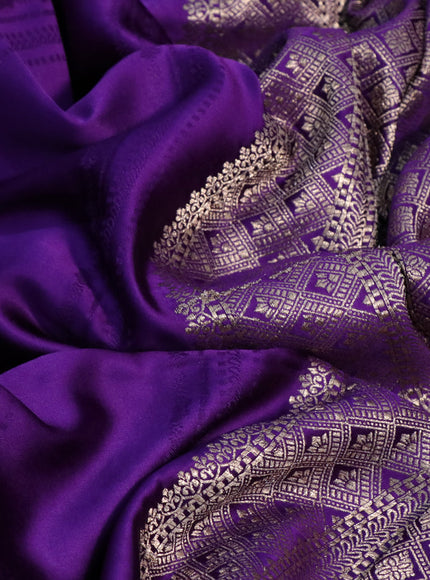 Mushru silk saree violet with allover self emboss and zari woven butta border