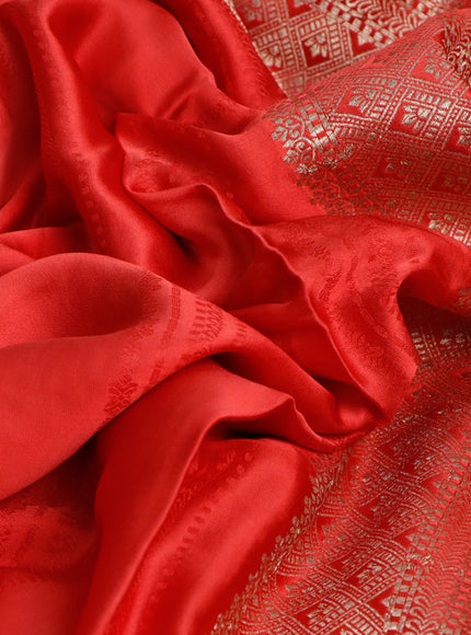 Mushru silk saree red with allover self emboss and zari woven butta border