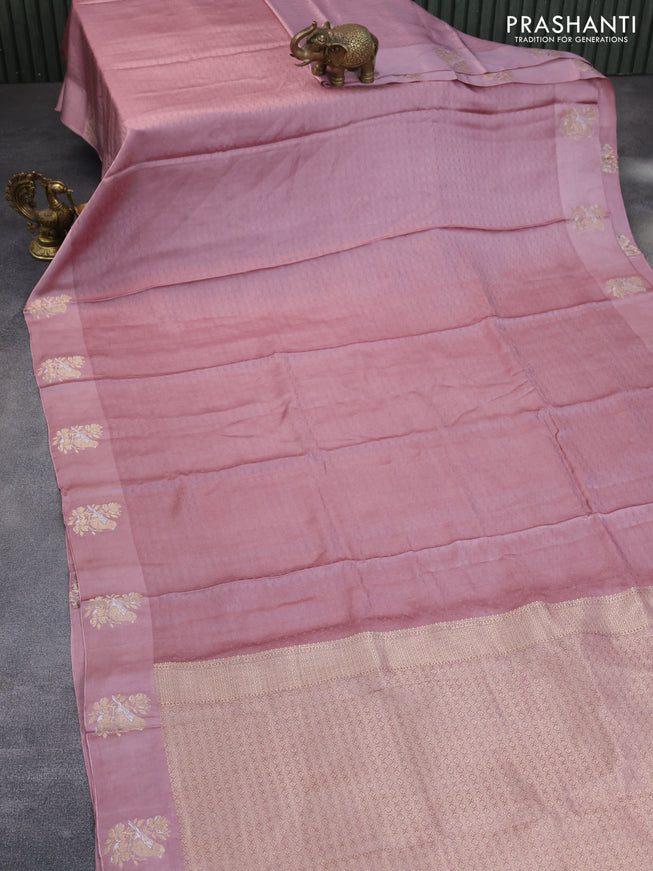 Mushru silk saree pastel pink with allover self emboss and zari woven butta border