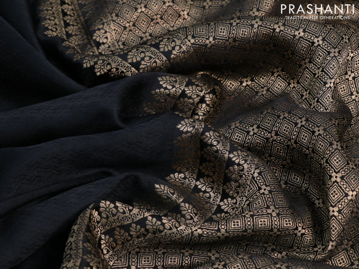 Mushru silk saree black with allover self emboss and zari woven elephant butta border