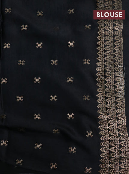 Mushru silk saree black with allover self emboss and zari woven elephant butta border