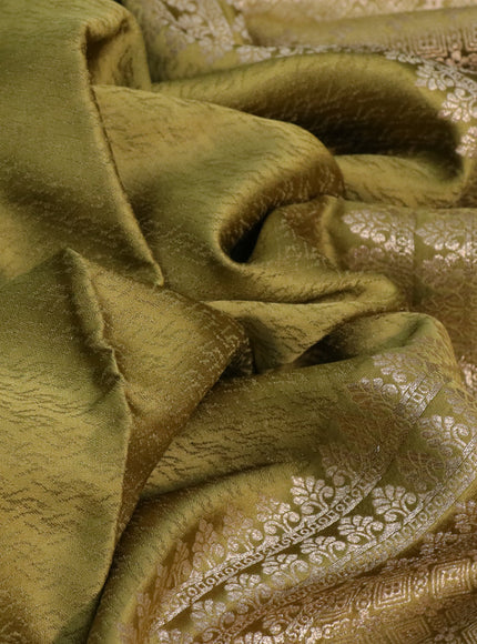 Mushru silk saree olive green with allover self emboss and zari woven elephant butta border