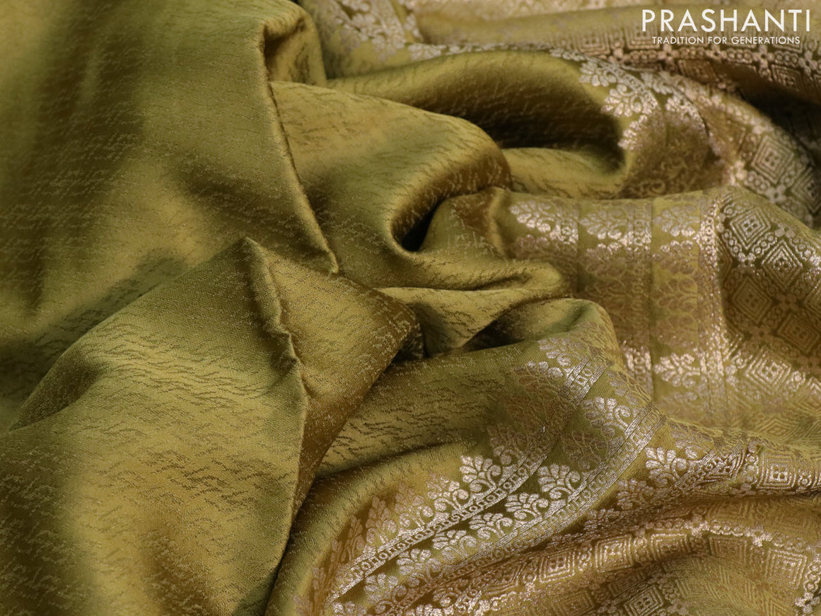 Mushru silk saree olive green with allover self emboss and zari woven elephant butta border