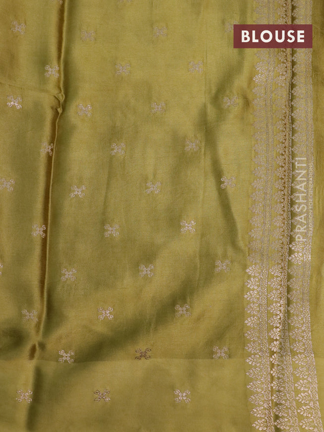 Mushru silk saree olive green with allover self emboss and zari woven elephant butta border