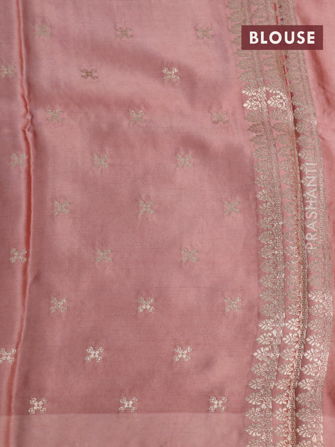 Mushru silk saree pastel peach with allover self emboss and zari woven elephant butta border