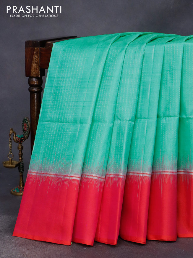 Pure soft silk saree teal green and dual shade of pinkish orange with allover zari weaves and silver zari woven simple border