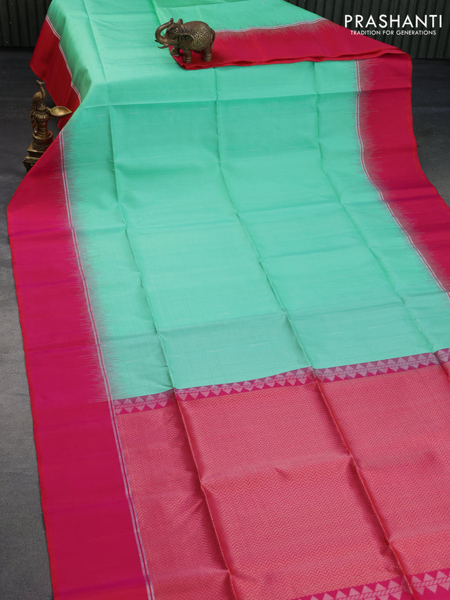 Pure soft silk saree teal green and dual shade of pinkish orange with allover zari weaves and silver zari woven simple border