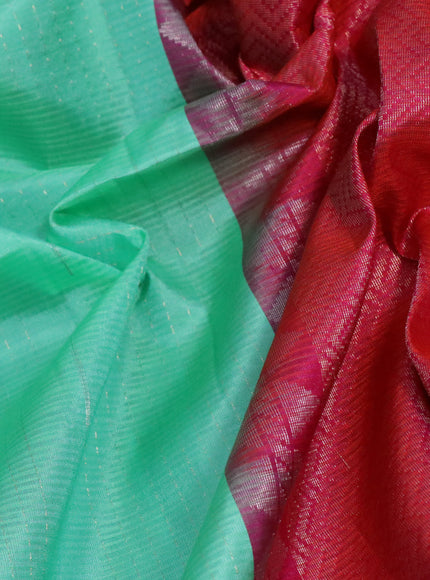 Pure soft silk saree teal green and dual shade of pinkish orange with allover zari weaves and silver zari woven simple border